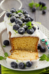 Lemon cake with blueberry glaze.
