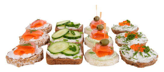 Delicious canapes isolated on white