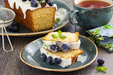 Lemon cake with blueberry glaze.