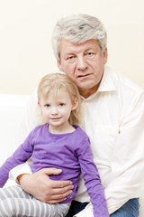 portrait of grandfather with his granddaughter