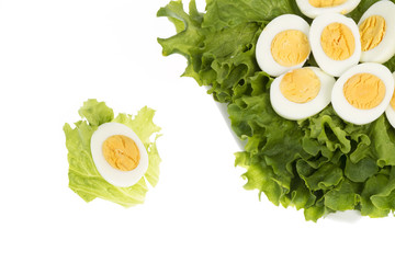 gekochte Eier mit Salat, Eigelb