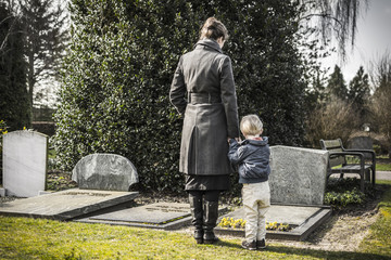 mother and child at graveyard