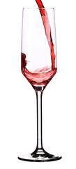 Red champagne pouring in a glass.