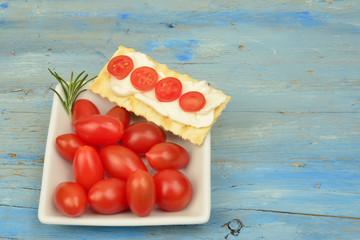 appetizer cheese and cherry tomatoes