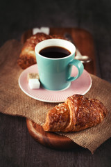 Croissants and coffee cup