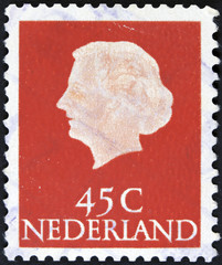 Stamp printed in the Netherlands shows Queen Juliana, circa 1953