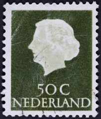 Stamp printed in the Netherlands shows Queen Juliana, circa 1953
