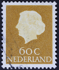 Stamp printed in the Netherlands shows Queen Juliana, circa 1953