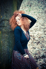 young beautiful red curly hair woman