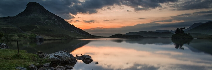 Panorama landscape stunning sunrise over lake in mountains
