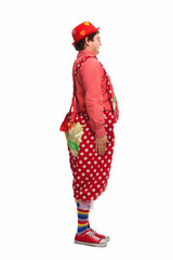 Funny adult dressed in clown isolated on white