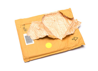 Brown torn envelope isolated on white background