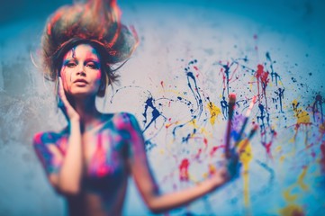 Young woman muse with creative body art and hairdo - obrazy, fototapety, plakaty
