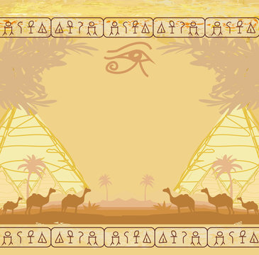 Traditional Horus Eye and camel caravan in wild africa landscape
