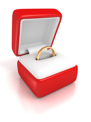 golden wedding ring in a red jewelry box
