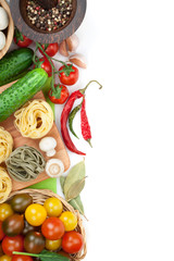 Fresh ingredients for cooking: pasta, tomato, cucumber, mushroom