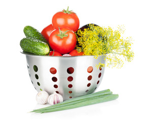 Fresh ripe vegetables in colander