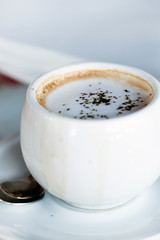 cup of cappuccino in cafe