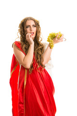 Ancient greece woman hands a bunch of grapes