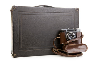 Old suitcase and camera