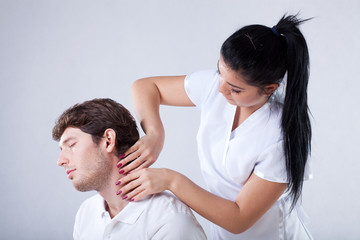 Obraz premium Massaging a neck