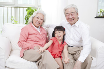 Obraz premium .Senior couple with granddaughter.