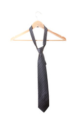 Elegant grey tie on wooden hanger isolated on white
