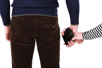 Pickpocket are stealing wallet,  close up, on light background