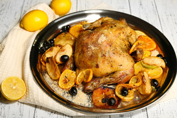 Whole roasted chicken with vegetables