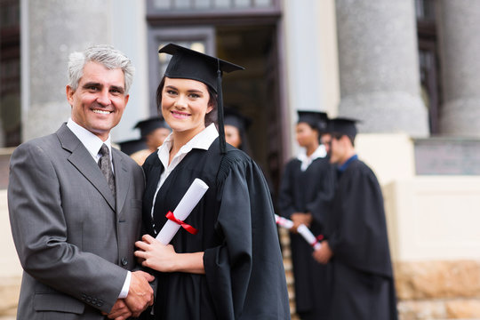 female graduate with her father