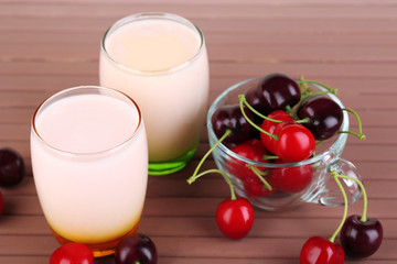 Delicious yogurt with fruits tastes in glasses and fresh fruits