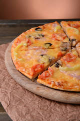 Tasty pizza on table close-up
