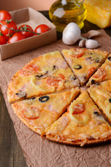 Tasty pizza on table close-up