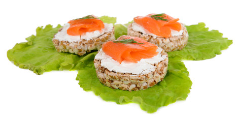 Delicious canapes isolated on white