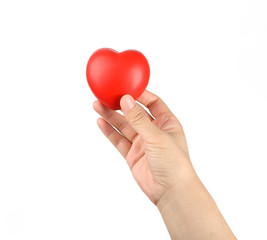 Obraz premium Hands holding red heart shape gift box