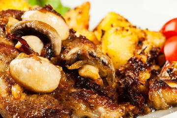 Fried pork chop with mushrooms
