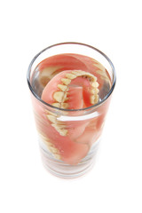 teeth prosthesis in the glass