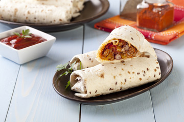 burritos wraps with meat beans and vegetables