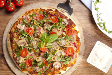 Pizza with ham and mushrooms