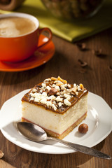 cheesecake with nuts on plate