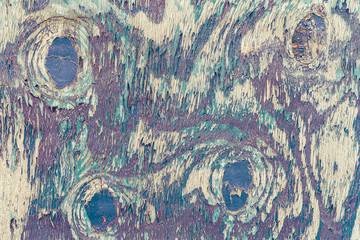 Abstract close up of peeling paint texture on wood