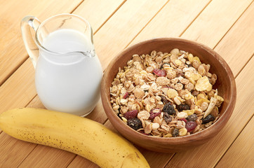 Delicious and healthy cereal in bowl with milk