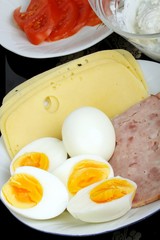 boiled eggs, cheese, ham and tomatoes