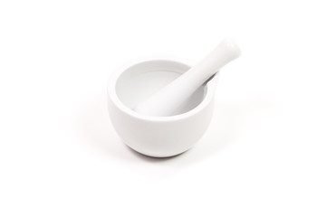 white porcelain mortar and pestle set