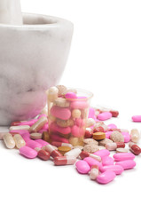 Pink pills and marble mortar