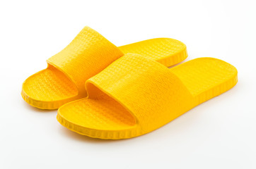 Yellow slippers isolated white background