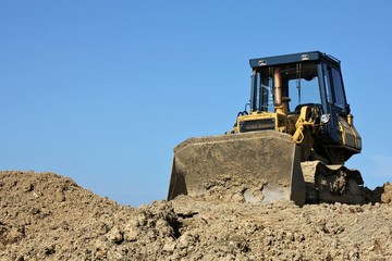 Obraz premium Planierraupe auf Baustelle