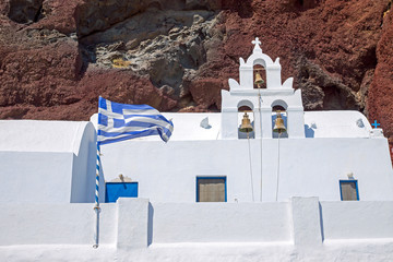White church and red cliff