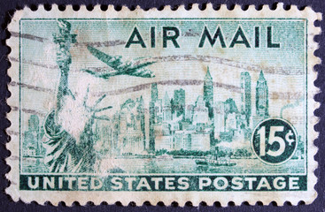 Statue of Liberty and New York on a postage stamp.