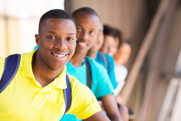 Fototapeta premium male african student with friends